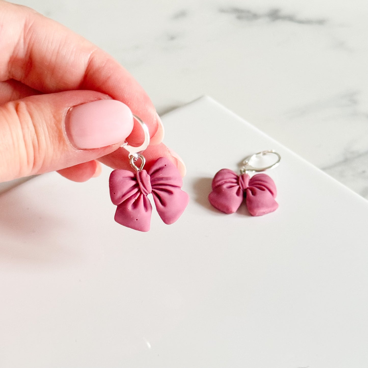 Mauve Opaque Resin Bow Huggies