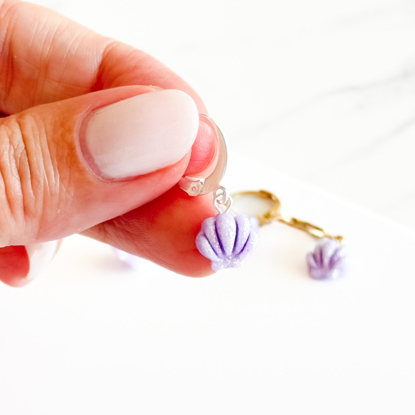 Lilac Glittery Shell Huggies