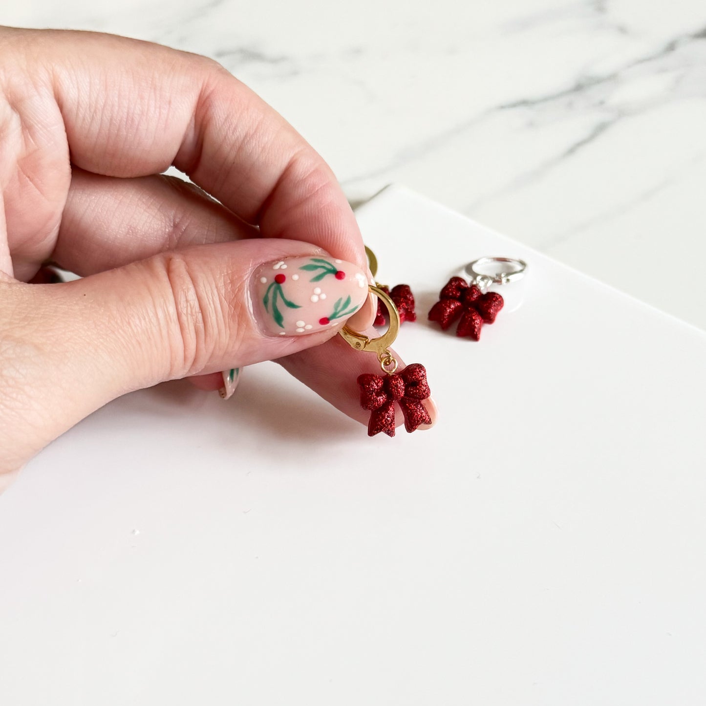 Glittery Red Christmas Bow Huggies